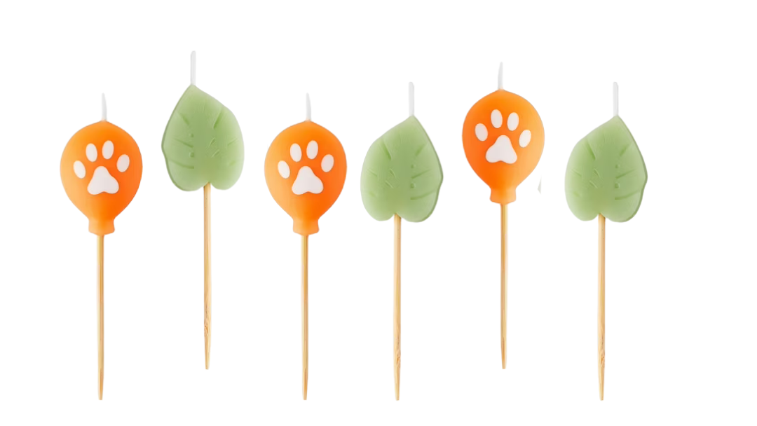 Birthday candles shaped like jungle leaves and paw prints, perfect for a wild one or safari-themed party cake.